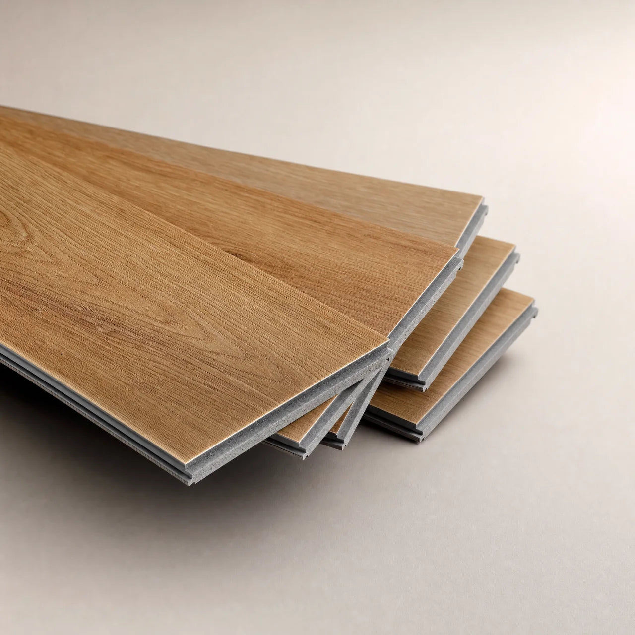 Waterproof rigid-core SPC plank showing the wood-look surface over a dense stone-composite core