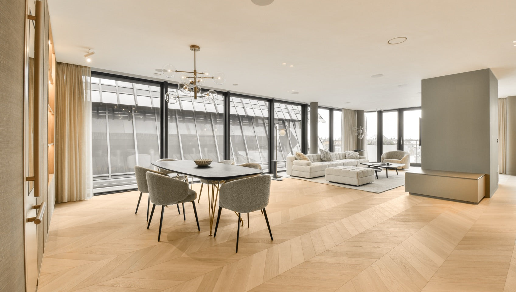 Premium wide-plank flooring in a sunlit living room